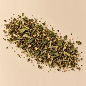 Mélange Calme intérieur : tulsi, citronnelle, mélisse et gingembre en vrac sur fond crème